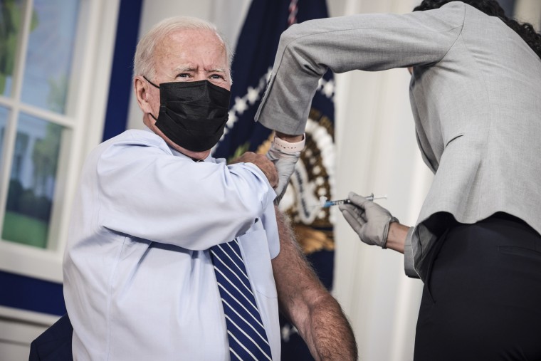 President Joe Biden receives a third dose of the Pfizer-BioNTech Covid-19 vaccine in the South Court Auditorium in the White House Sept. 27, 2021.