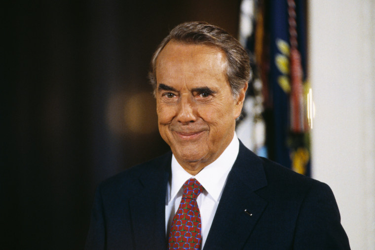 Sen. Bob Dole, R-Kan., smiles before receiving the Presidential Medal of Freedom in 1997.