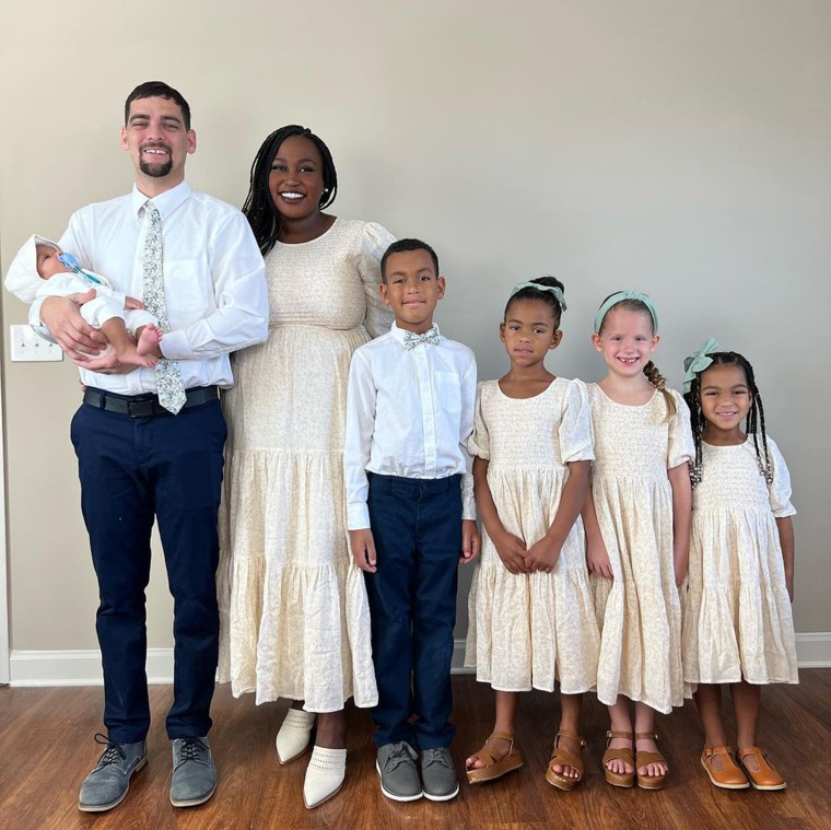 Drue and Jeena Wilder with their five children, who are all under the age of nine.