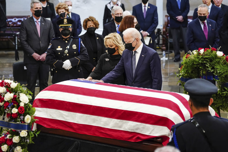 Image: President Joe Biden and first lady Jill Biden at the casket of former Sen. Bob Dole of Kansas, as he lies in state in the Rotunda of the U.S. Capitol on Dec. 9, 2021.