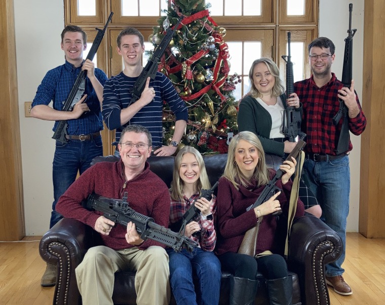 Rep. Thomas Massie, R-Ky., posted a photo of his family posing with guns on his Twitter account.