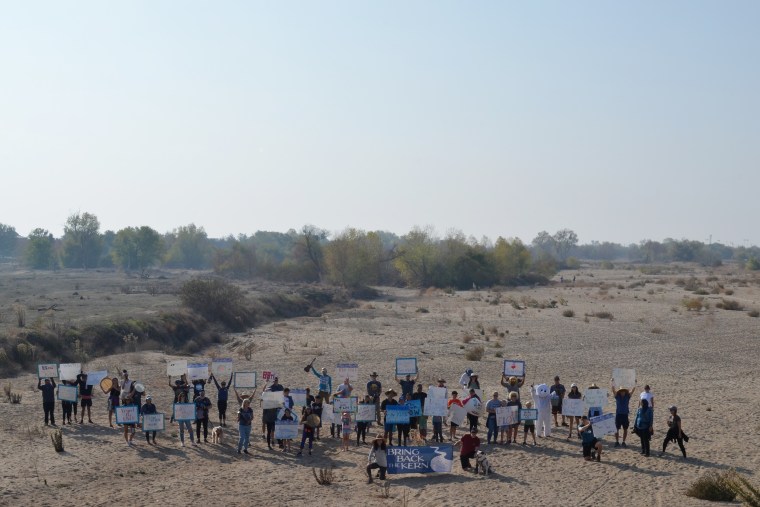 Image: Protesters on a river march to restore Kern River.