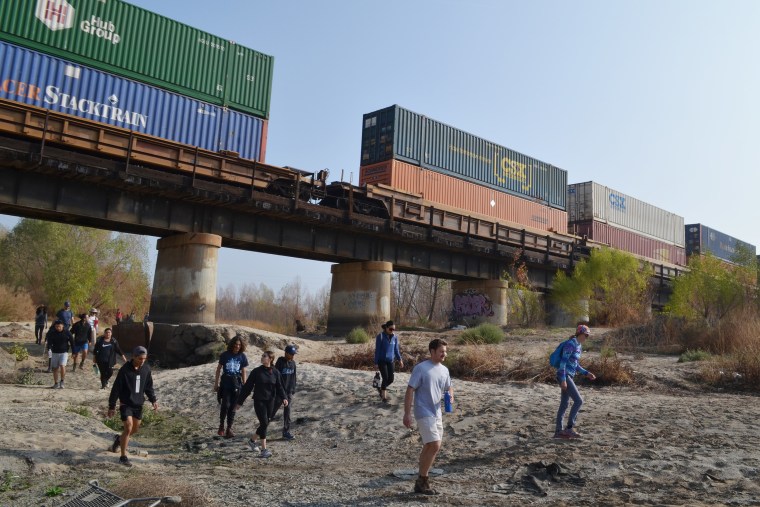 Image: Protesters on a river march to restore Kern River.