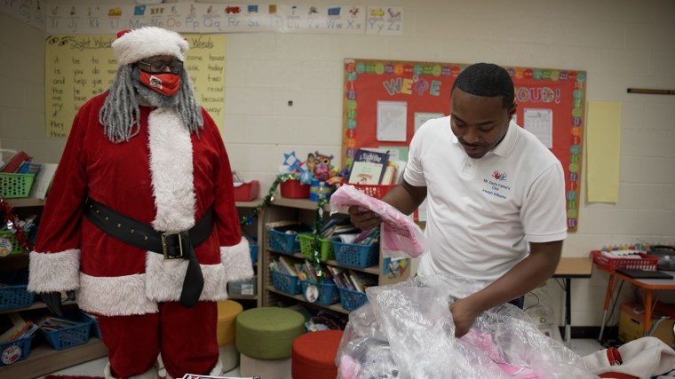 The organization's Black Santa Claus appears at some events and gives out necessary winter staples like hats and gloves. 