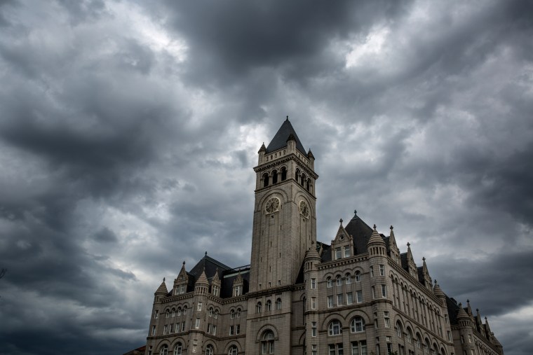 Image: A thunderstorm builds over the Trump International Hotel in Washington, D.C., on June 5, 2018.
