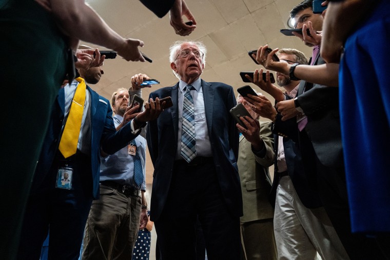 Image: Sen. Bernie Sanders, I-Vt.,  with reporters on Capitol Hill on July 21, 2021.