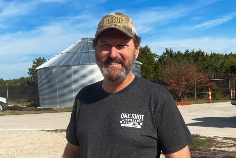 Retired Col. Phil Waldron poses for a photo at his distillery in Dripping Springs, Texas, on Dec. 2, 2021.