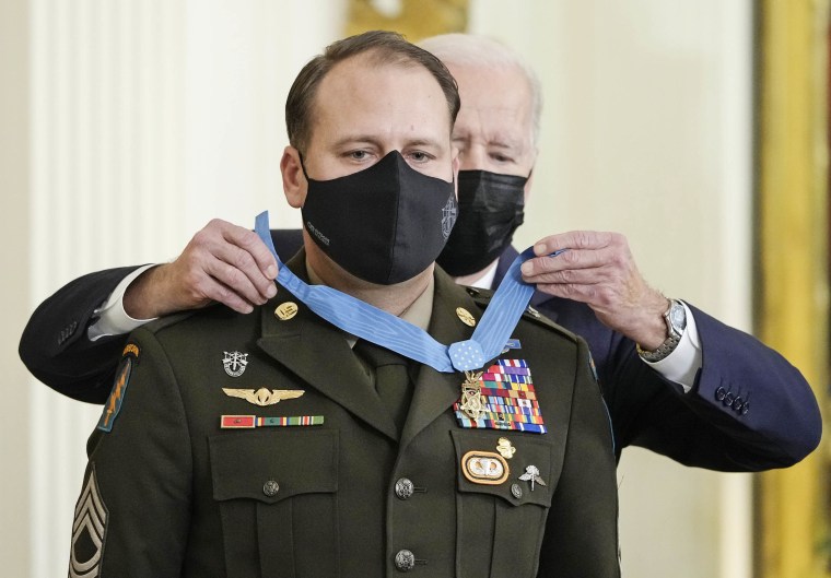 President Joe Biden awards the Medal of Honor to Army Master Sgt. Earl Plumlee in the East Room of the White House on Dec. 16, 2021.