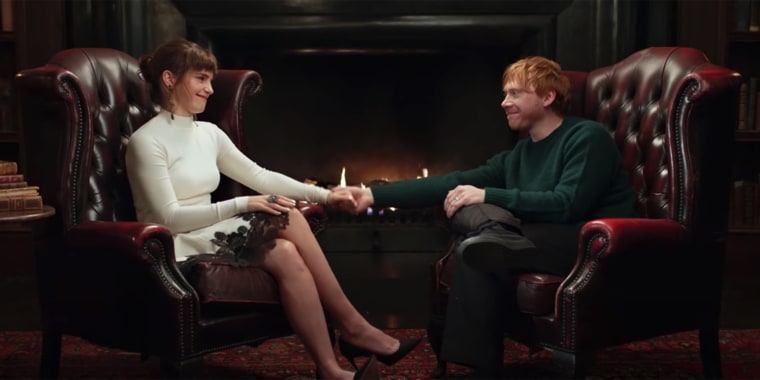 Emma Watson and Rupert Grint share a moment in the special. 