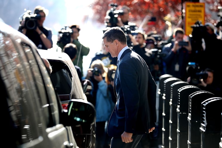 Image: Michael Flynn leaves federal court following his plea hearing