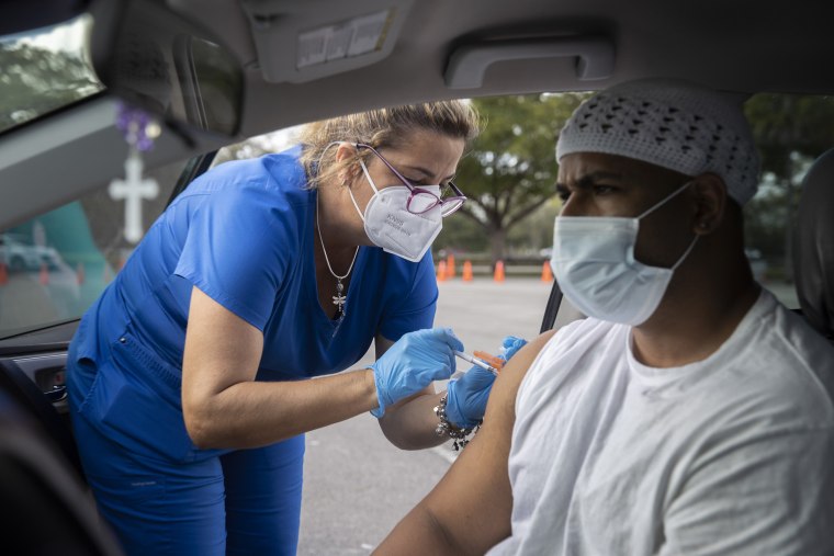 A drive-thru vaccination site at Tropical Park on Dec. 16, 2021 in Miami.