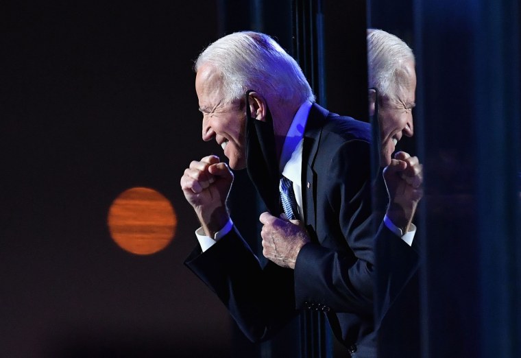 President-elect Joe Biden gestures to the crowd after he delivered remarks in Wilmington, Del., on Nov. 7, 2020, after he was declared winner of the election.
