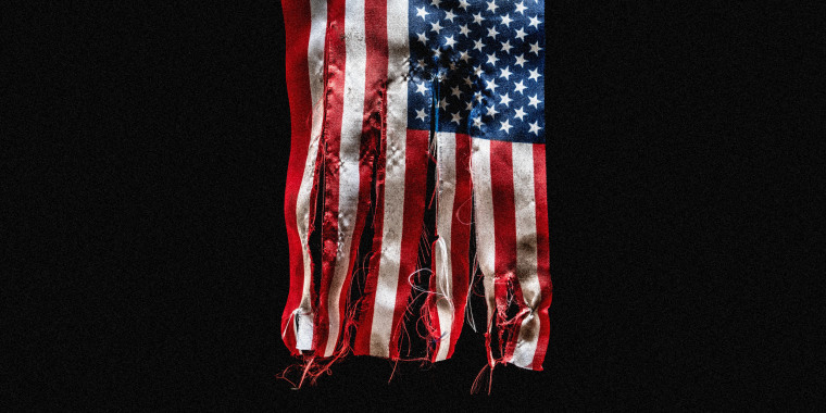 Image: tattered and torn American flag.