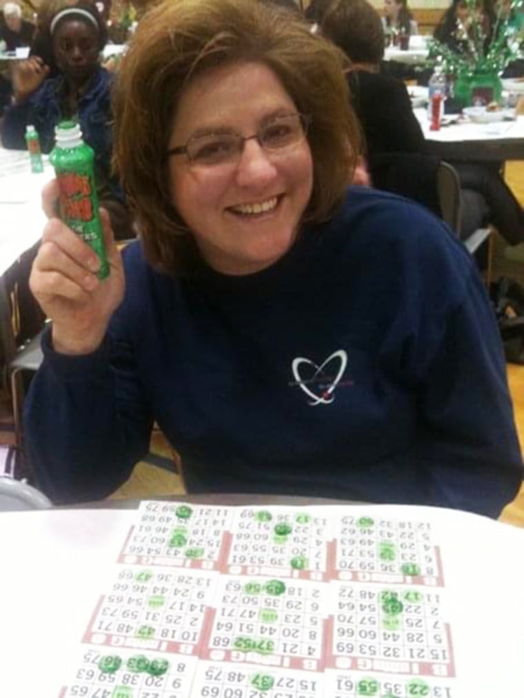 Rose Giroux Kalinski plays bingo at a church fundraiser.