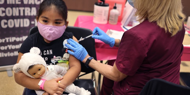 Kid getting a covid vaccine