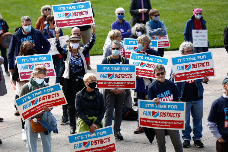 Image: Supporters of Fair Districts in Ohio rally outside the Ohio Statehouse in Columbus, Ohio, after an Ohio Redistricting Commission meeting on Oct. 28, 2021.