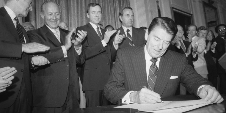 Image: President Reagan signing the extension of the 1965 Voting Rights Act.