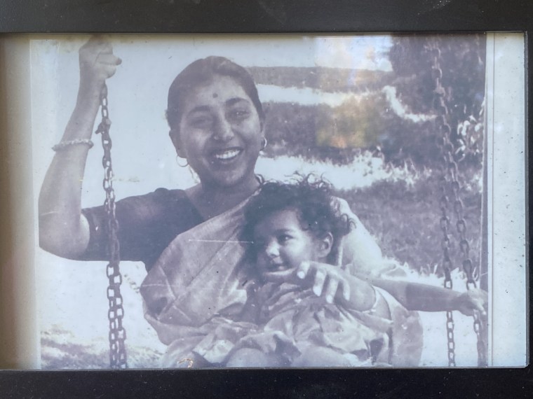 Ann Mukherjee, as a young child, with her mother.