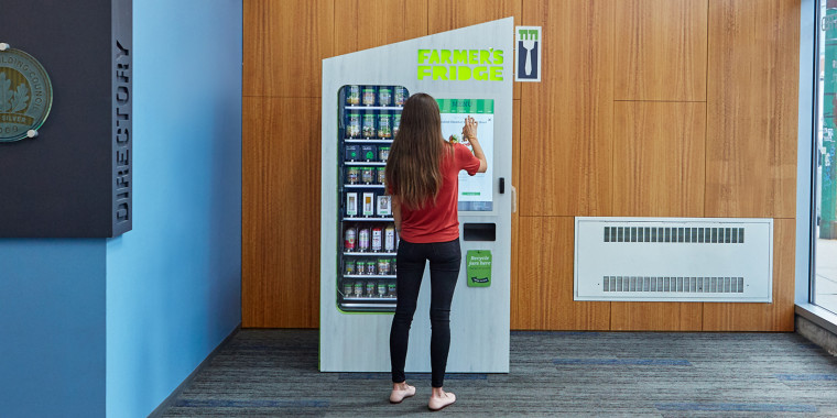 A Farmer's Fridge vending machine monitors the temperature of items and locks food that are past their prime. 