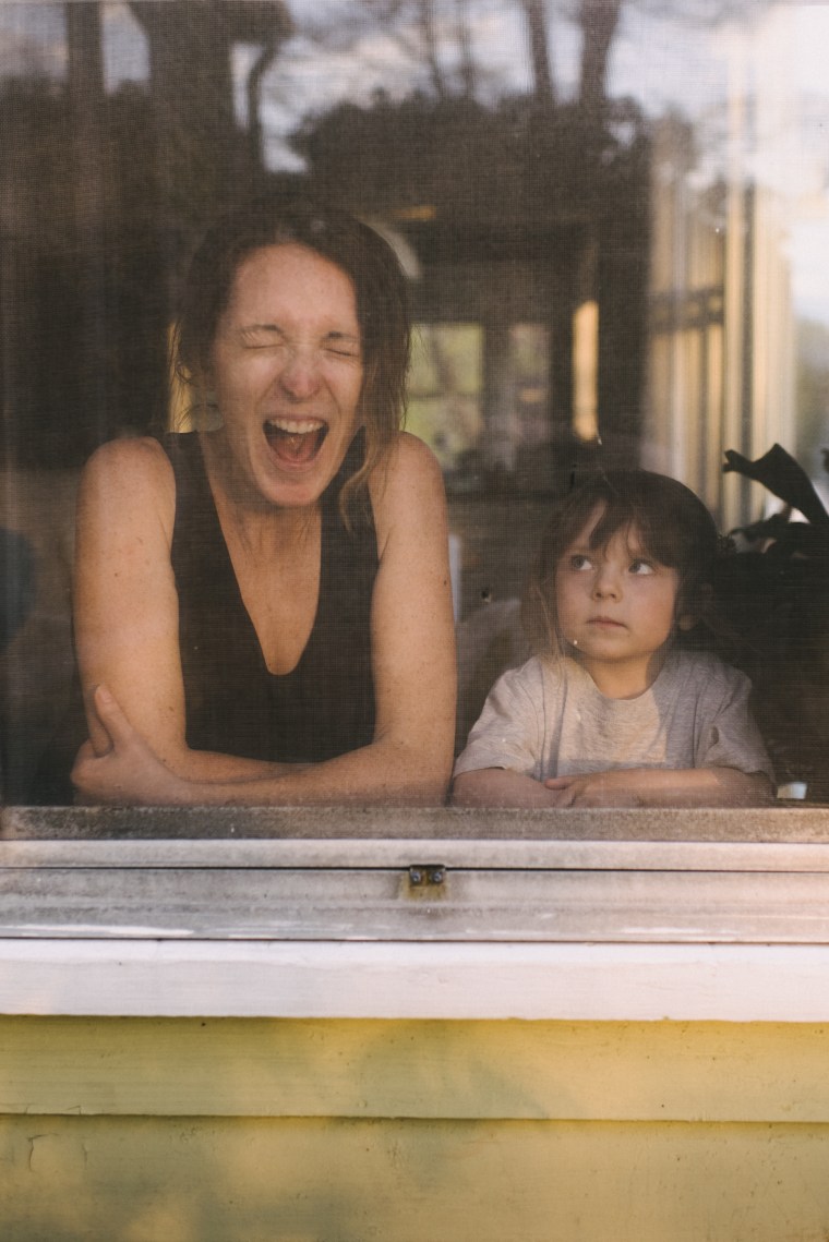 Alice Rouse, a local photographer, felt so inspired by the event that she created a series of photos of moms screaming silently in their homes. Above is one of her photos.