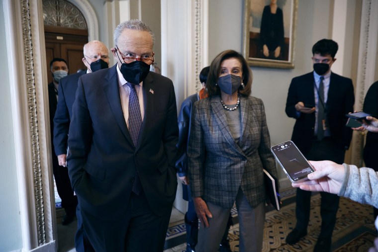 Image: Senate Majority Leader Charles Schumer and Speaker of the House Nancy Pelosi speak to reporters following a meeting at the Capitol on Feb. 1, 2022.