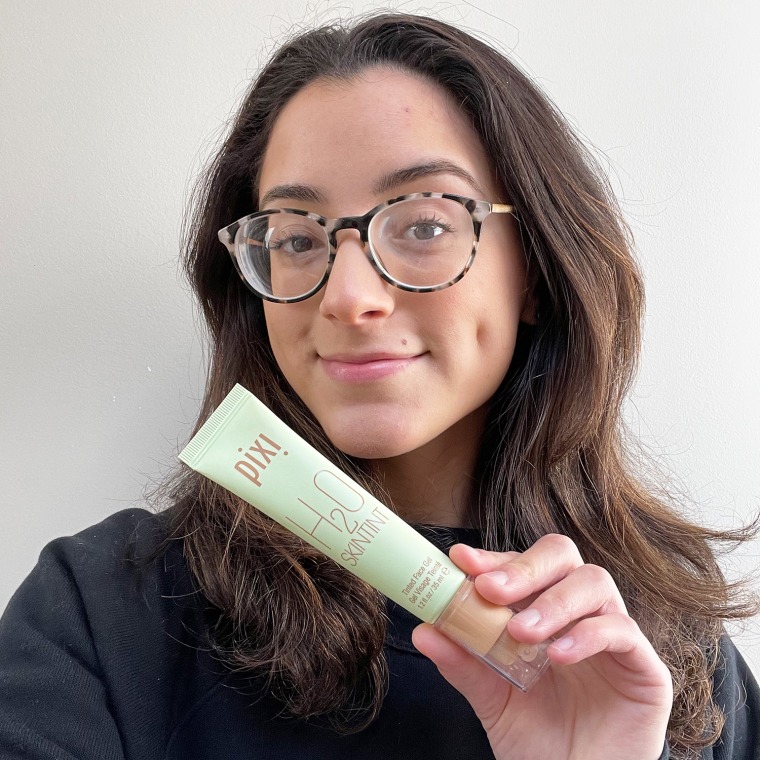 Editorial Assistant Jillian Ortiz with her new favorite foundation — the Pixi H2O Skin Tint.