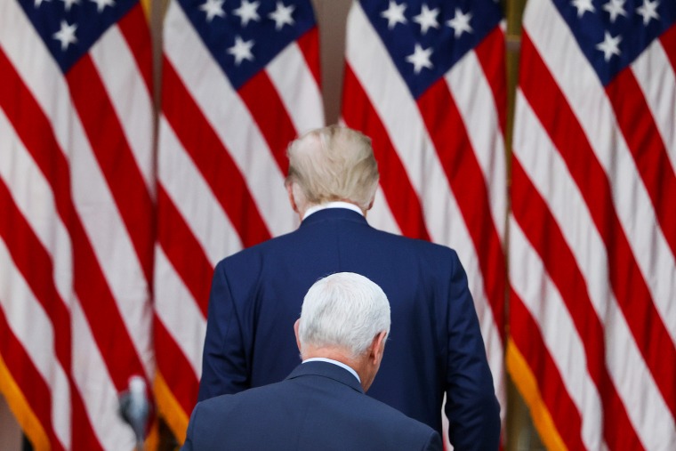 President Donald Trump and Vice President Mike Pence walk away after speaking about Operation Warp Speed in the Rose Garden at the White House on Nov. 13, 2020.