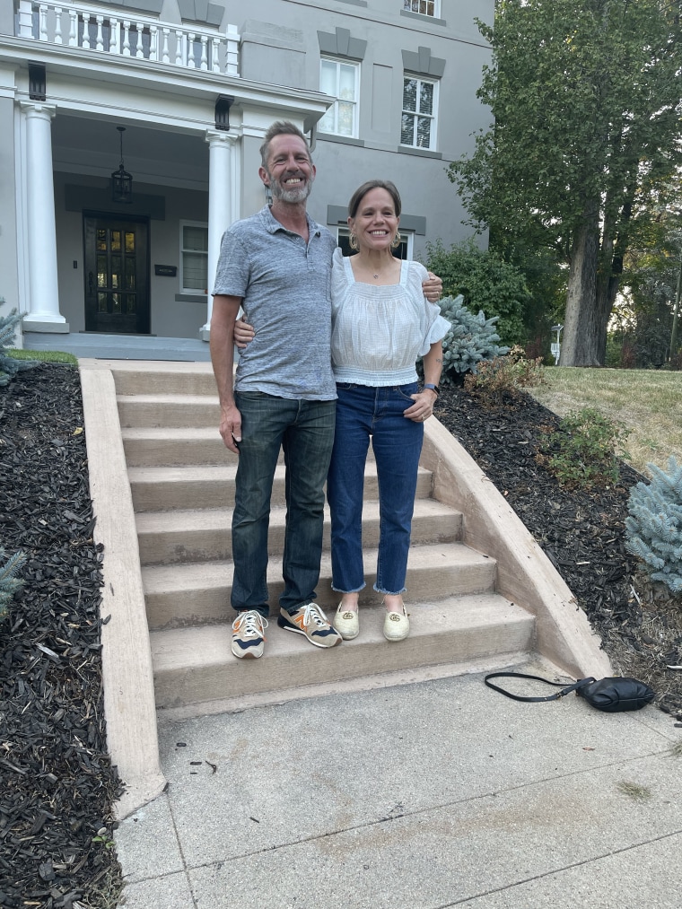 Jennifer Sey and her husband in front of their Denver home.