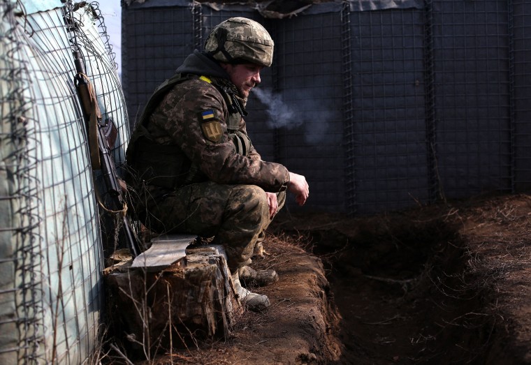 Image: A Ukrainian serviceman at a position on the front line with Russia-backed separatists near the settlement of Troitske in the Lugansk region on Tuesday.