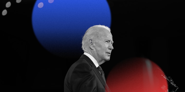 Photo illustration: A blue and red lens flare above an image of Joe Biden speaking.