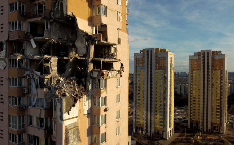 Image: An apartment building in Kyiv was damaged after it was reportedly struck by a Russian rocket on Feb. 26, 2022.