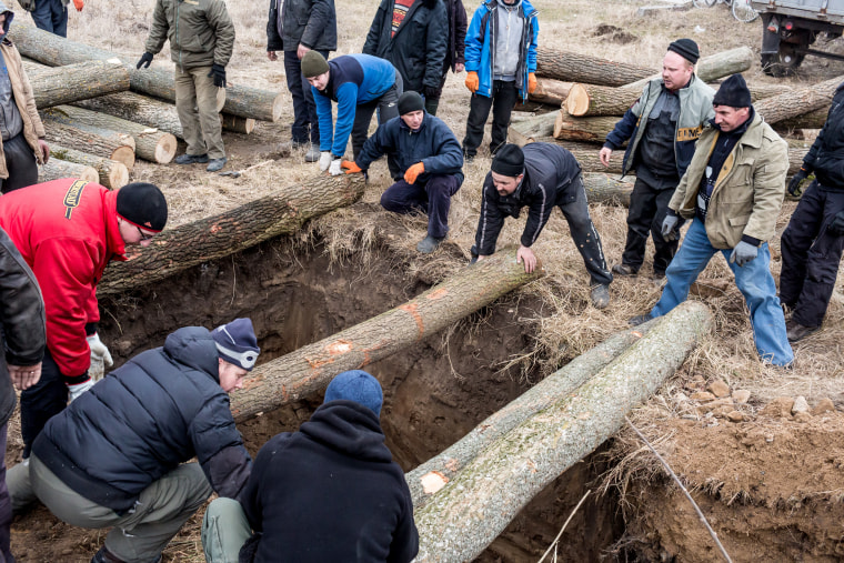 Local people gather to defend their villages