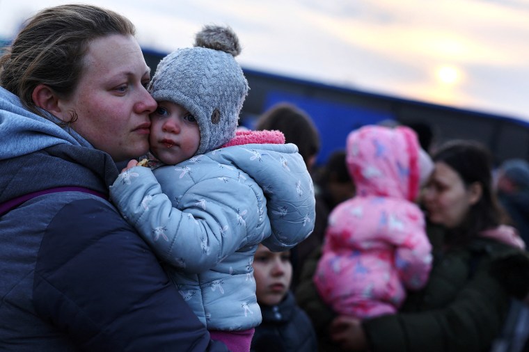 Image: Refugees arrive at the Polish border town of Przemysl after fleeing from Ukraine due to the Russian invasion