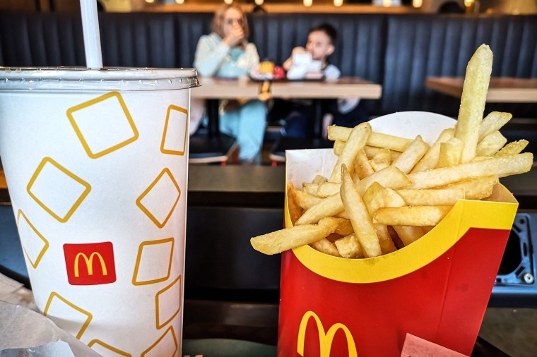 Diners at a McDonald's restaurant in Moscow on Wednesday as some major brands continue to pull out of Russia.