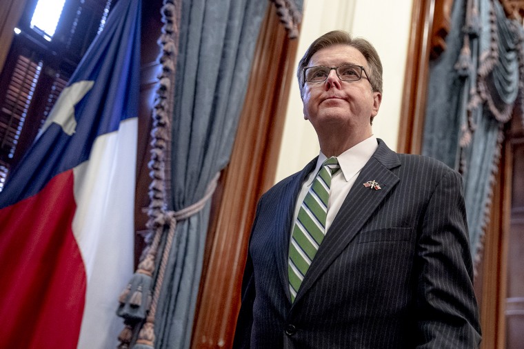 Texas Lt. Gov. Dan Patrick exits a press conference at the state Capitol in Austin on March 31, 2020.