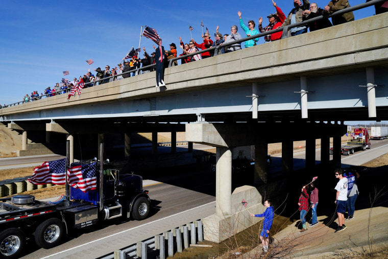Image: Truckers and their supporters form a convoy bound for the nation's capital