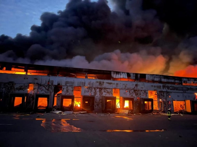 Image: A warehouse storing frozen products is seen on fire after shelling in Kyiv region