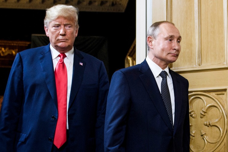 President Donald Trump and Russian President Vladimir Putin arrive at a meeting in Helsinki on July 16, 2018.