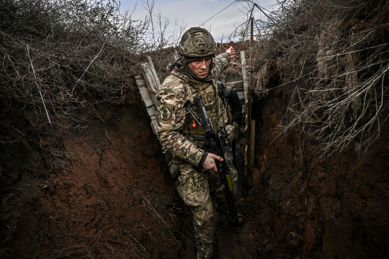 Image: Ukrainian troops patrol the frontline to the east on Feb. 19, 2022.
