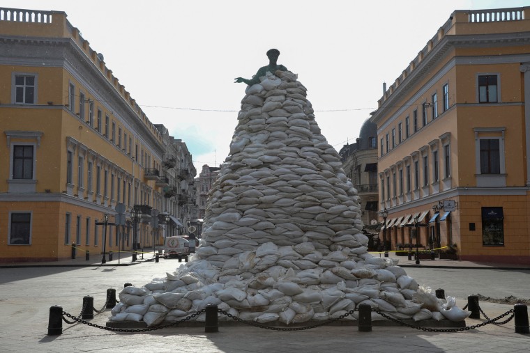 Image: Monument of city founder Duke de Richelieu is seen covered with sand bags for protection in Odessa