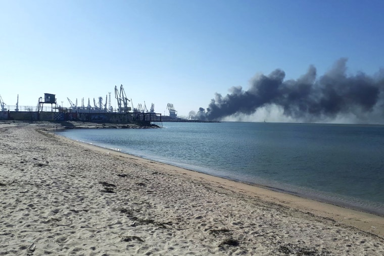 Smoke rises near a seaport in Berdyansk, Ukraine on Thursday after Ukraine's navy reported that it had sunk the Russian ship Orsk in the Sea of Asov.
