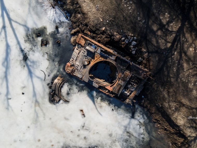 Image: Destroyed Russian tank is seen near the town of Trostianets