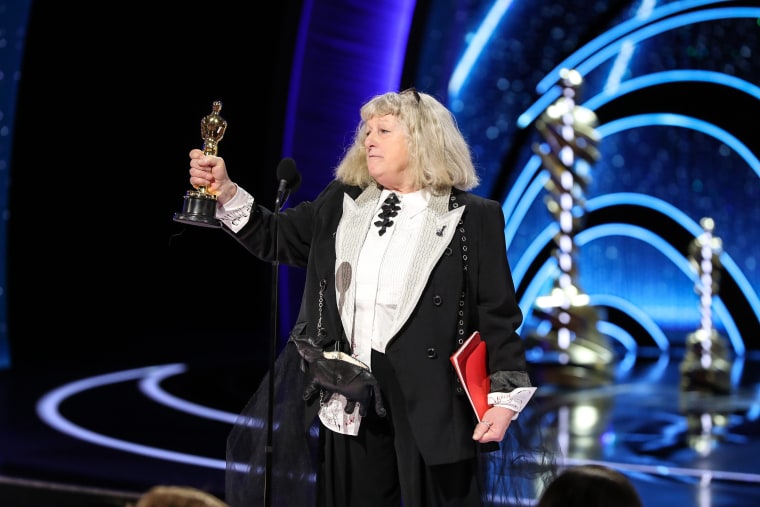 Jenny Beavan accepts the award for best costume design for "Cruella" at the Oscars on Sunday in Los Angeles.