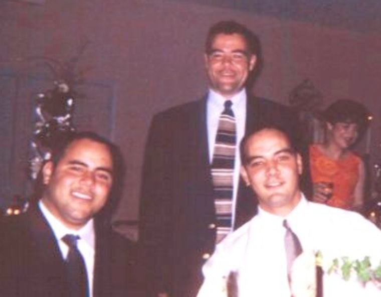 Kent Jacobs with his brothers, Kelvin (right) and Keith (left).