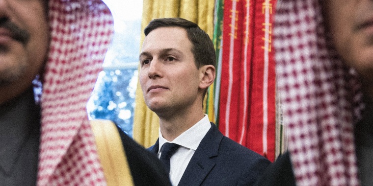 Image: Jared Kushner standing among Saudi officials at the White House.