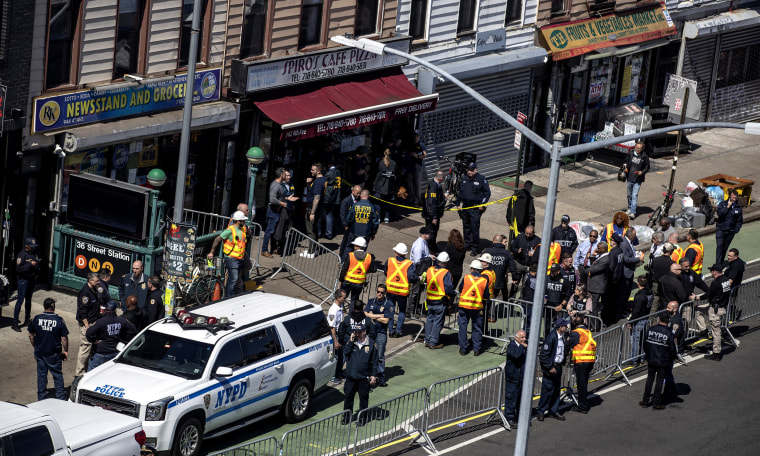 Image: Aerial view of law enforcements officers at the scene of a shooting at the 36th Street subway station in the Sunset Park neighborhood in Brooklyn, New York.