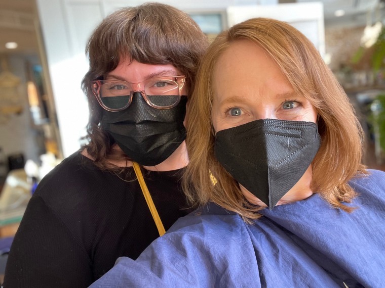 Folsom, right, with her hairdresser Sara Steigman, after deciding to get bangs.