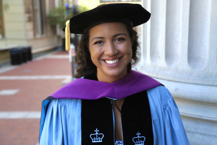 Joella Jones while graduating from Columbia Law School.  Jones currently owes $363,066 in federal loans for his law, masters and undergraduate degrees.