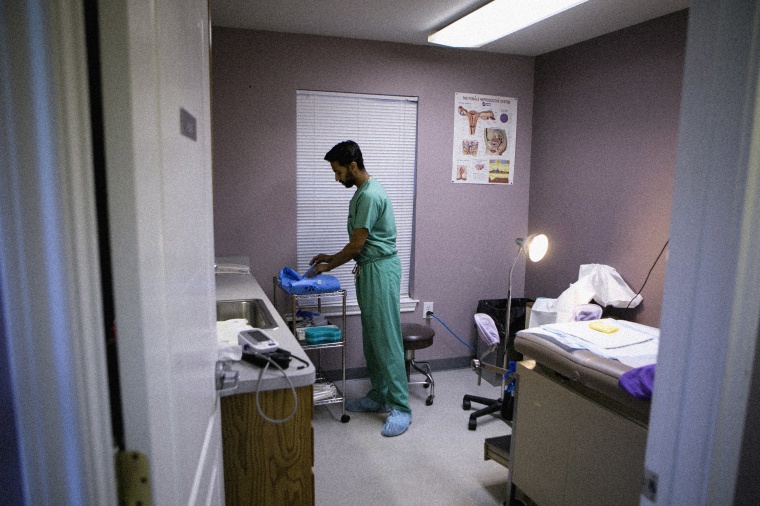 Image: Dr. Bhavik Kumar prepares a procedure room for a patient at Whole Woman's Health Clinic in Fort Worth, Texas, in 2016.