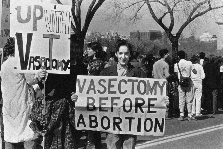 Image: Campaigners supporting vasectomy as a means of birth control before abortion at a National March for Women's Lives in Washington in 1986.